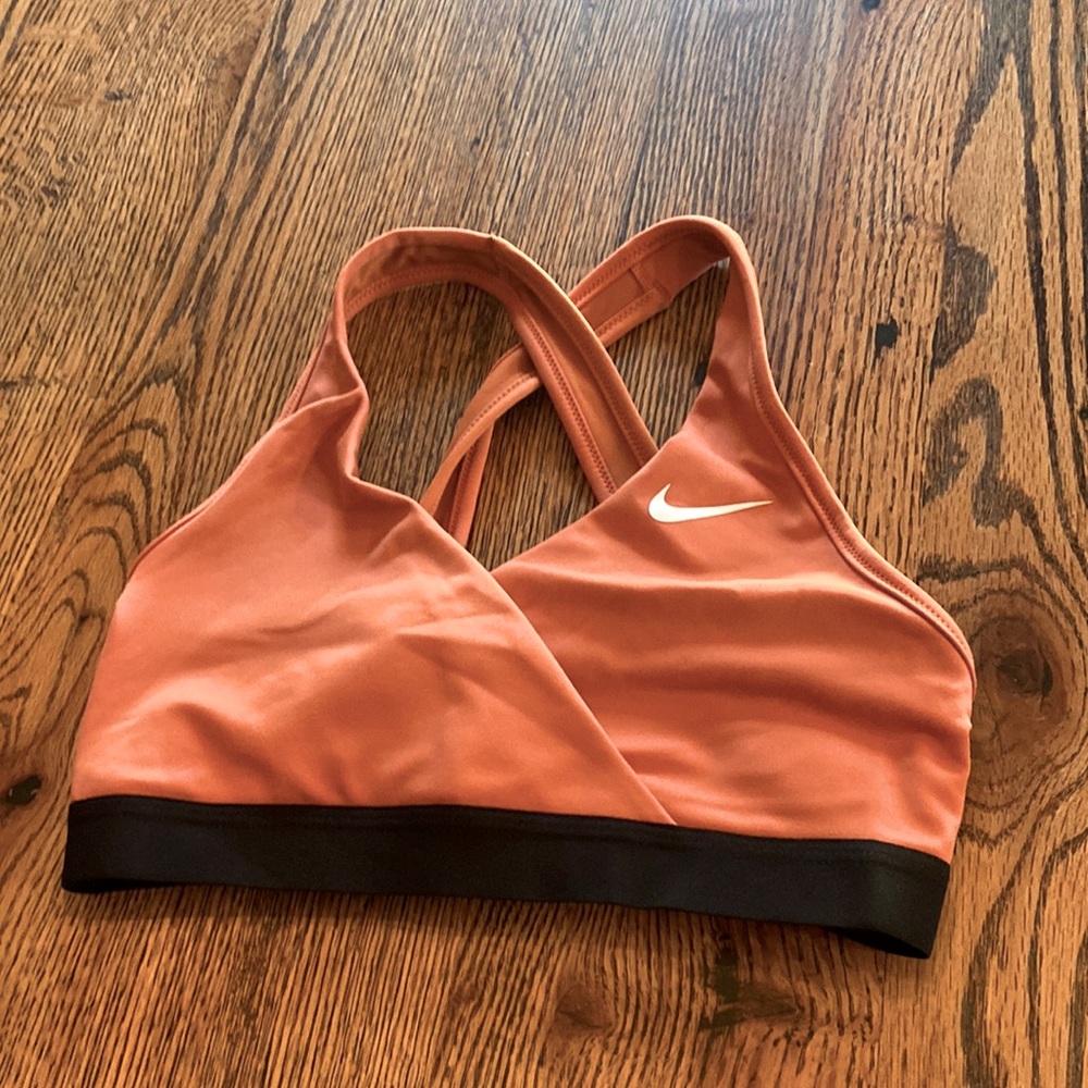 Orange nike criss-cross sports bra. Medium, great condition